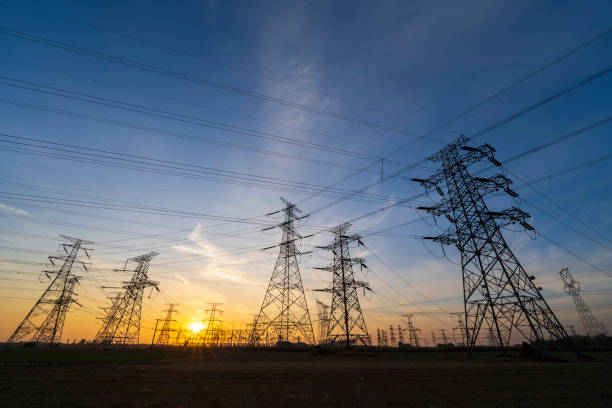 istock Pylons, high voltage pylons in the evening 2197595913
