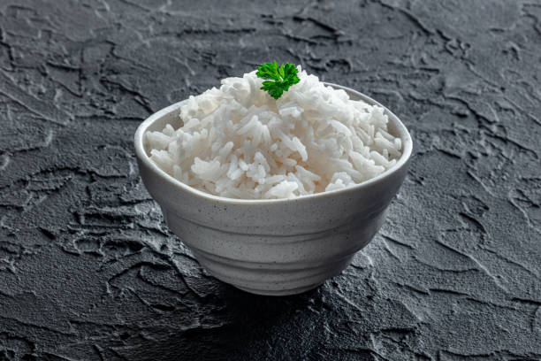 istock White rice, cooked. A bowl of boiled long grain rice, a simple side dish 2197597486