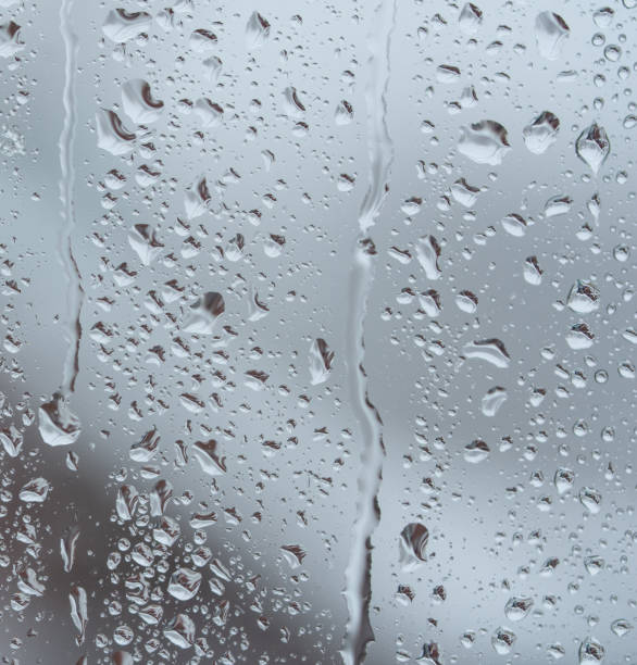 istock The glass is covered with raindrops. Macro photo 2197598852
