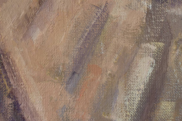 Abstract colorful background with chaotic brush strokes of an oil paint over canvas backdrop