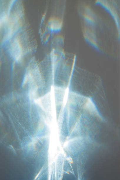 istock Water texture shadow with rainbow refraction of light on a white backgound. Overlay effect 2197604469