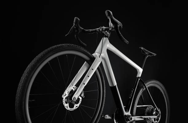 istock Gravel bicycle, shot from bottom of front wheel. Black background. 2197605901