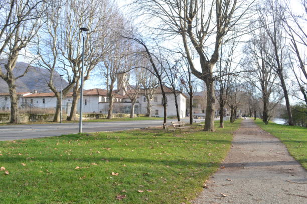 istock Panoramic view of park and medieval Lavello monastery in winter sunny day. 2197608527