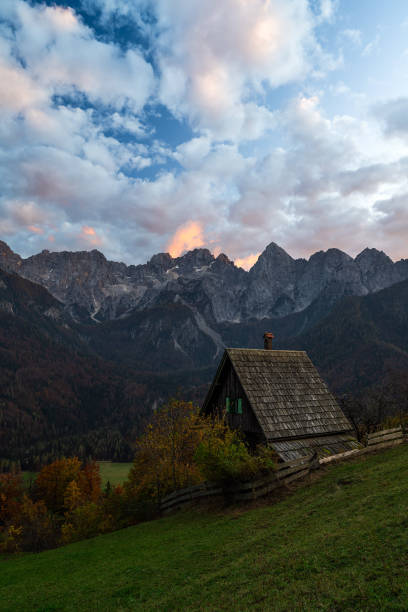 istock Sunset over a small hut in the Julian Alps meadows 2197610508