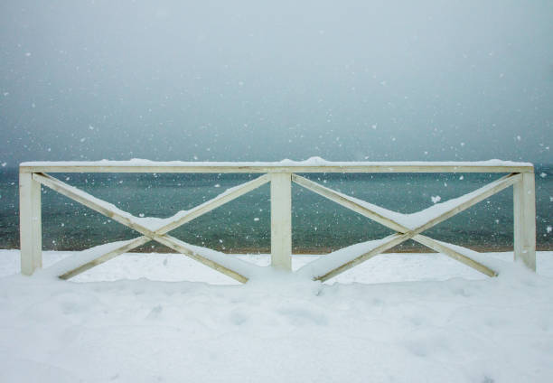 istock The sea beyond the fence 2197610753
