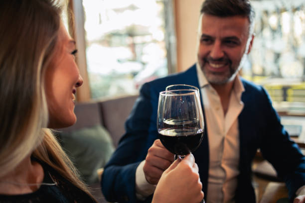 istock A joyful pair celebrating Valentine's Day with a toast 2197616960