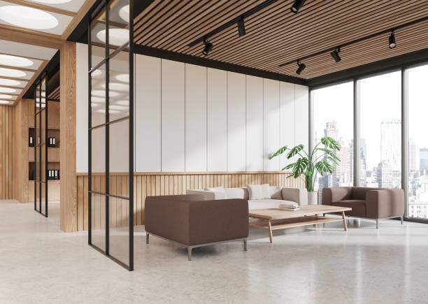 istock Modern office lounge area with wooden elements and large windows overlooking cityscape. 3D Rendering 2197617216