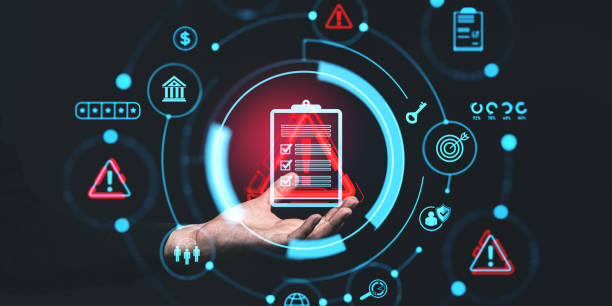 istock Hand holding digital icons for risk management and assessment on a dark background, symbolizing business strategy and control 2197617340