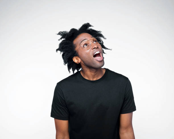 Potrait of surprised man in black outfit