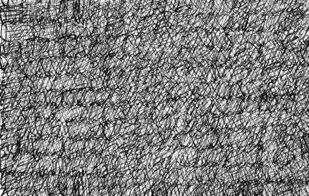 istock Close up of a black pencil and felt-tip pen stroke for design on white paper background 2197622797