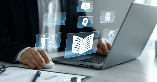 istock E-learning education.Education internet Technology.Business person who attends online lessons on a digital technology screen. Digital internet lessons and online webinar on virtual screen. 2197623246