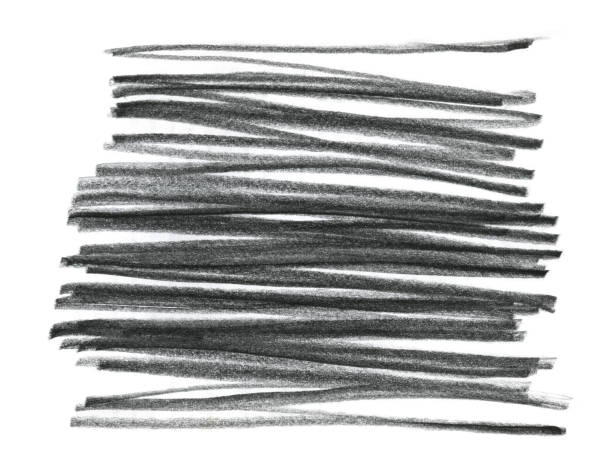 istock Close up of a black pencil and felt-tip pen stroke for design on white paper background 2197623430