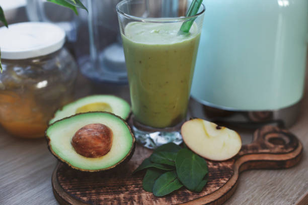 istock Preparation of healthy green smoothie 2197623829