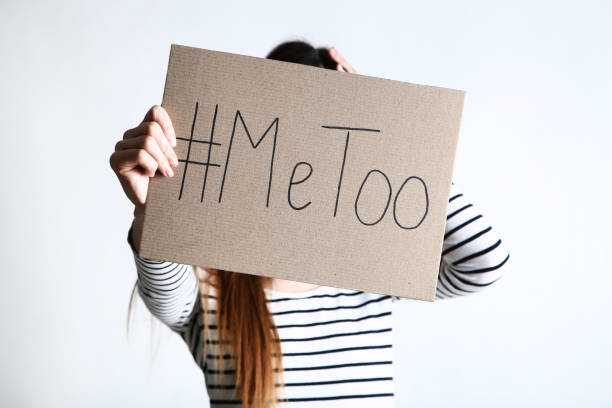 istock Woman holding paper with text Me Too on grey background 2197624108