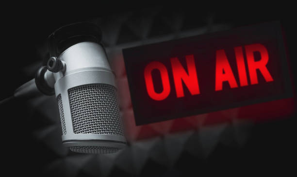 istock Professional microphone and on air sign 2197625198