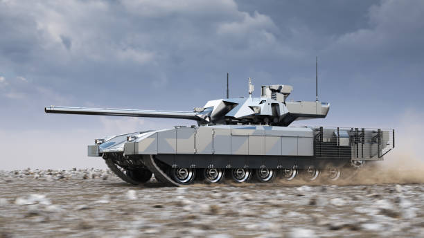 istock Modern tank rides across the field 2197625628
