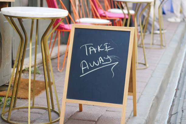 istock Chalkboard Sign for Takeaway Food Outside a Cozy Caf 2197626501