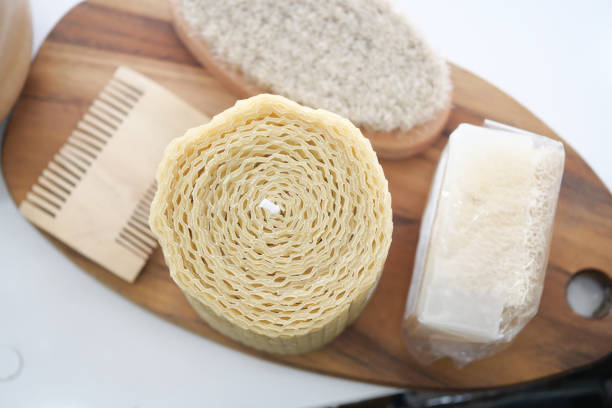 A beautiful display of elegant bath accessories thoughtfully arranged on a rustic wooden board