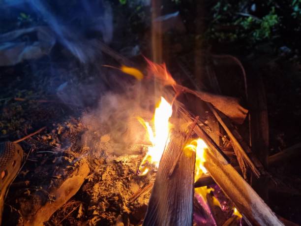 Burning bonfire, feels getting warmer from cold weather.