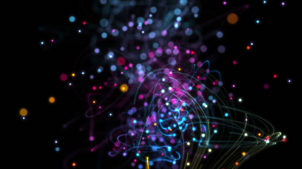 istock 8K resolution floating multicolor glitter particle blurry bokeh in dark background 2197632472