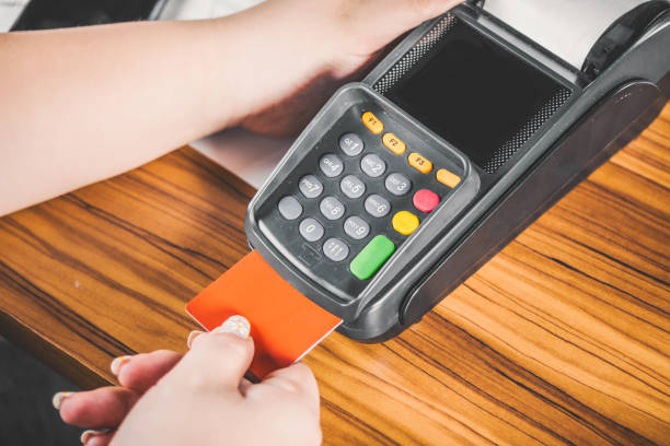 istock Color image of a POS and credit cards. 2197634335