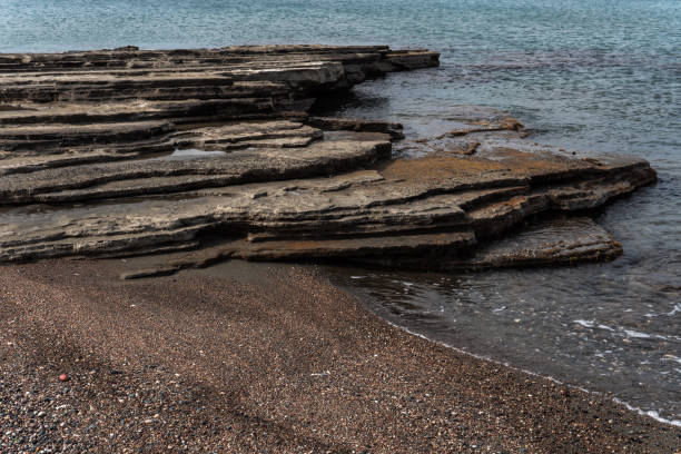 Rocky Shoreline with Layered Rocks.