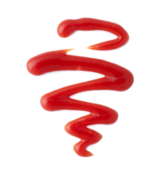 istock Drawn curved ketchup line close up isolated on white background 2197640694
