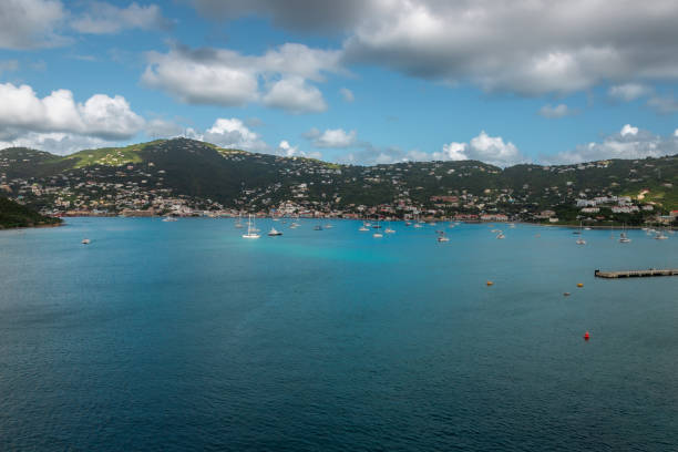 Exposure done at Sunrise while arriving at at Charlotte Amalie by Cruise Ship, with views of the Deep Harbor with its amazing water colours, St. Thomas, US Virgin Islands