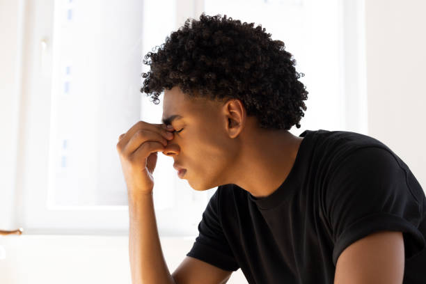 istock Young male felling stressed and overwhelmed 2197646134