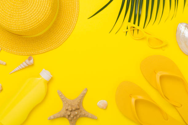istock Flat lay with yellow summer outfit on color background. Vacation concept 2197646321