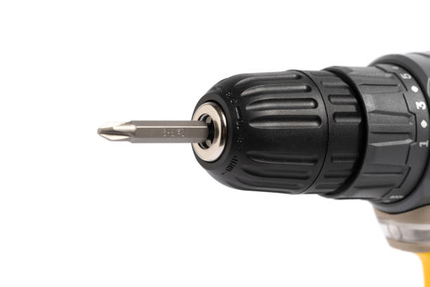 istock Cartridge cordless screwdriver is highlighted on white background. Closeup. 2197647124