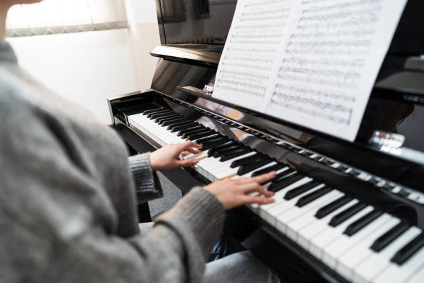 istock Hands of a female piano player 2197650515