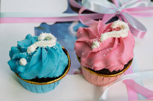 pink and blue cake with the question boy or girl