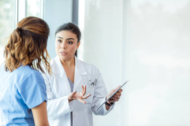 istock Doctor and Patient Discussing Treatment Plan in Clinic 2197657100