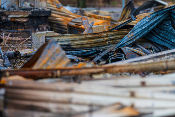 pile of twisted rusted metal debris from collapsed structure