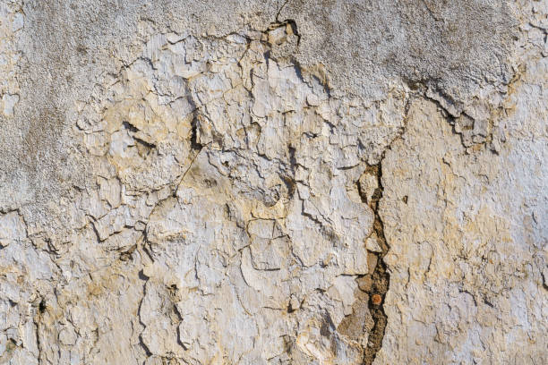istock textured background of an old wall with cracked and peeling paint. 2197666696
