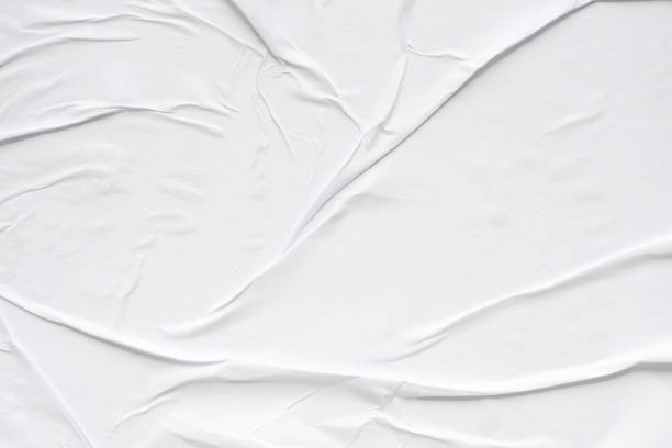 istock White blank crumpled and creased paper poster texture background 2197672617