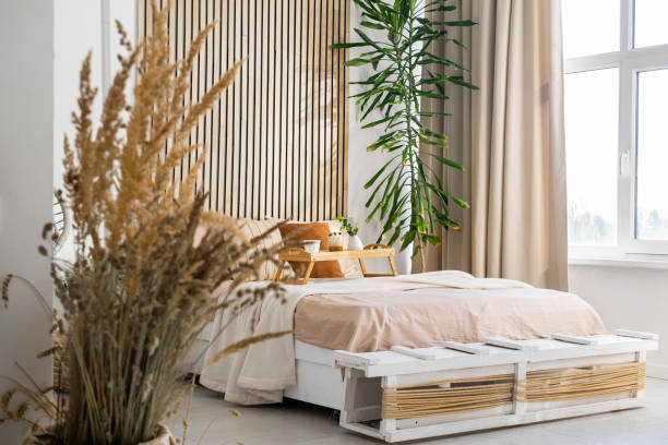 istock Cozy bedroom with natural decor and warm sunlight in a modern setting 2197674168