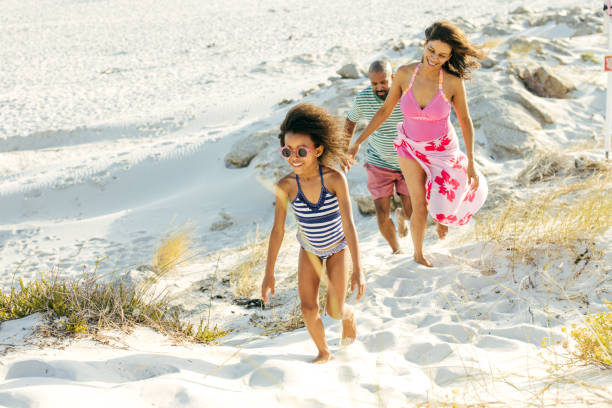 istock Waves, Laughter, and Family Bonding on a Beach Adventure 2197674338