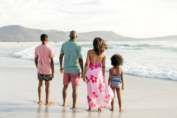 istock Strolling the Shoreline: Family Bonding on Beach Walks 2197674346