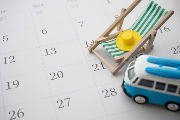 istock Green beach chair, hat and classic van on blank white calendar background. 2197676056