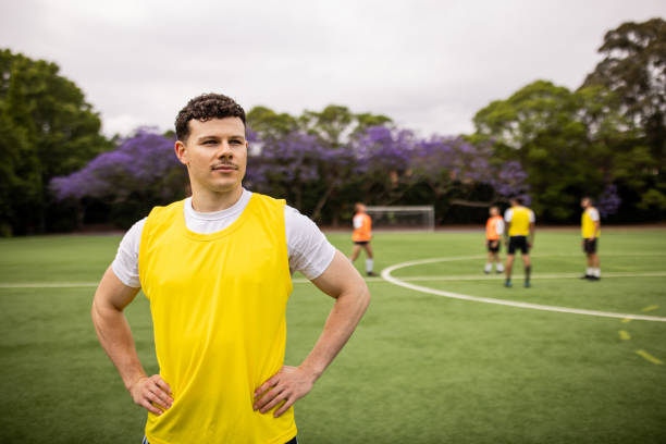 istock Soccer Player Standing on Sports Field 2197676638