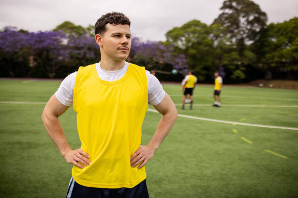 istock Soccer Player Standing on Sports Field 2197676655