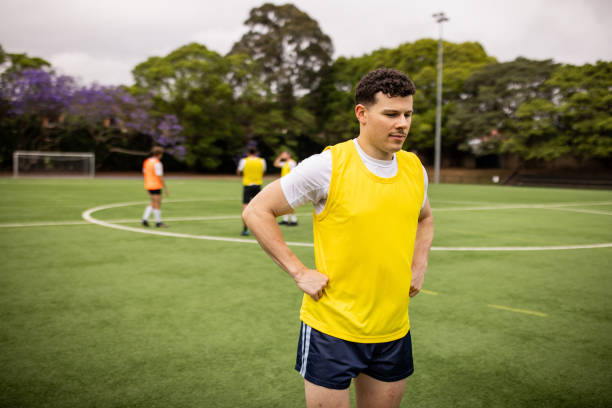 istock Soccer Player Standing on Sports Field 2197676661