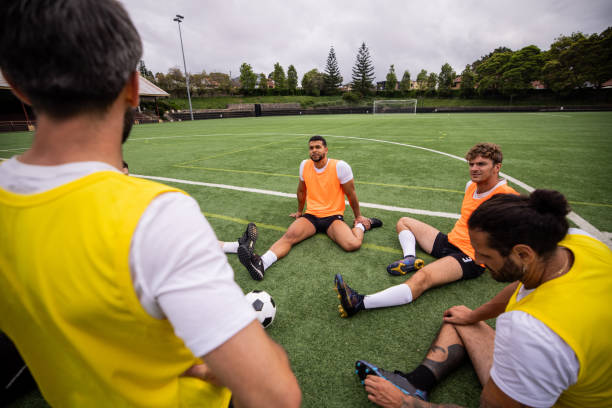 istock Team Warm-Up Session on the Soccer Field 2197678920