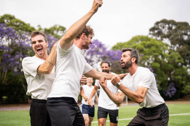 istock Soccer Team Celebrating Victory 2197681775