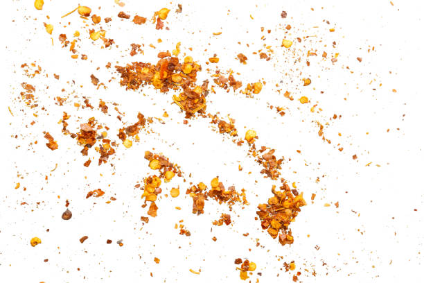 istock dried red chili pepper flakes and seeds isolated on white background 2197682786