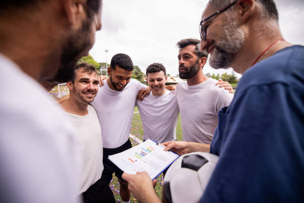 istock Coach Giving Tactical Instructions to Players 2197682992