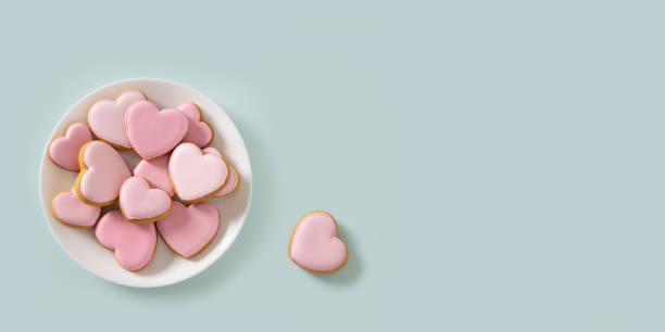 istock Valentine's Day heart shaped pink glazed cookies. 2197687017