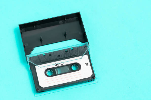 istock Old vintage audio cassette on green background. 2197687474